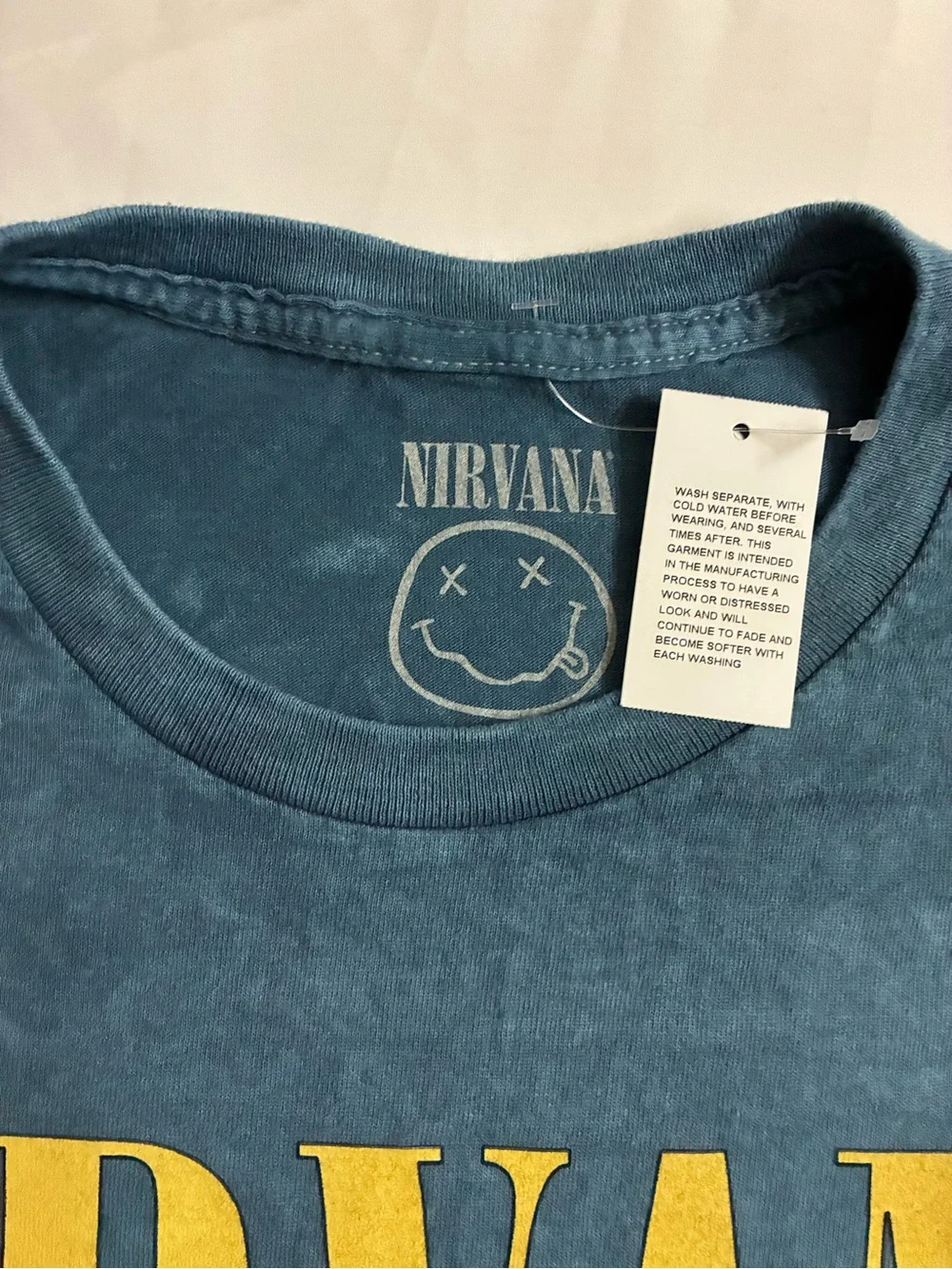 NIRVANA Blue Kids' Graphic Tee with Yellow Logo & Pink Teal Artwork